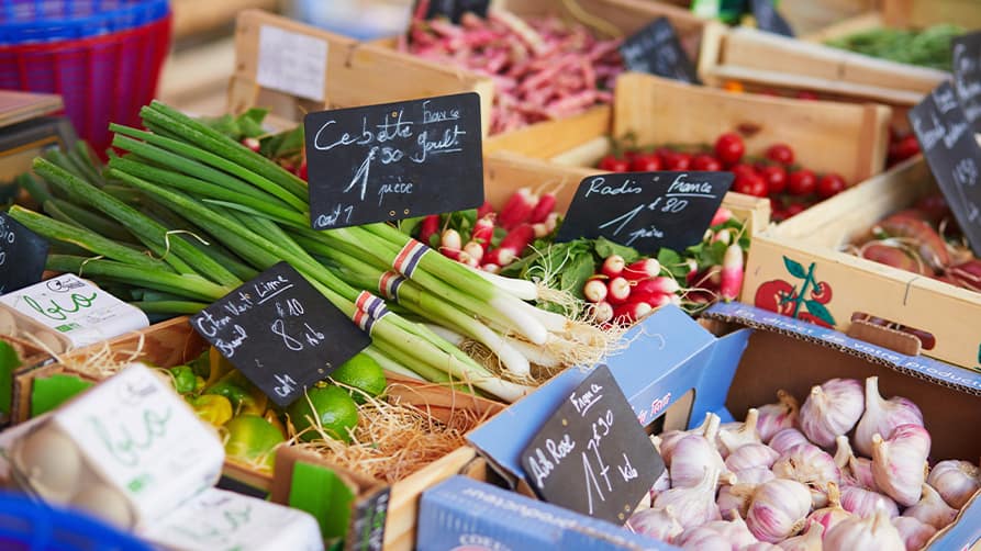 Close up of fresh produce in a food market in southern France, essential elements to the gourmet French Riviera cuisine you will enjoy during your next French Riviera yacht charter.