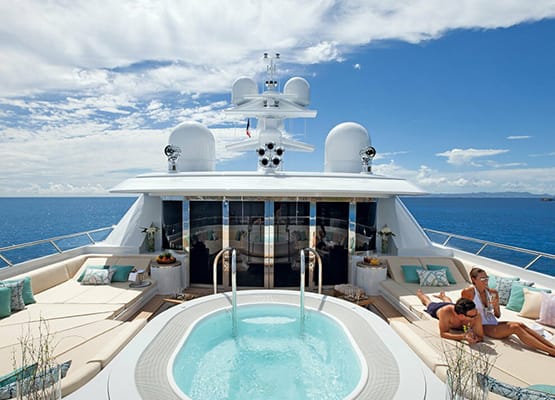 Modern pool sundeck on a luxury yacht for charter in the Mediterranean