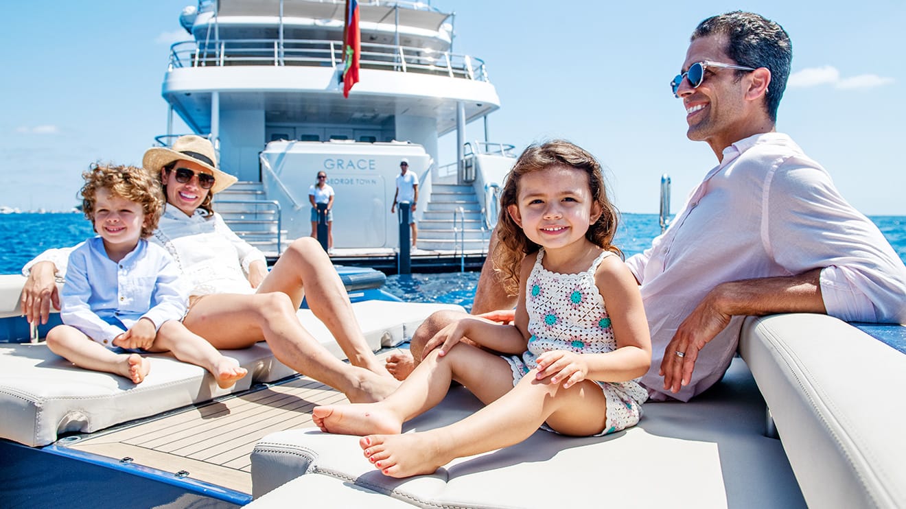 A family is enjoying the comforts of a luxurious yacht for charter
